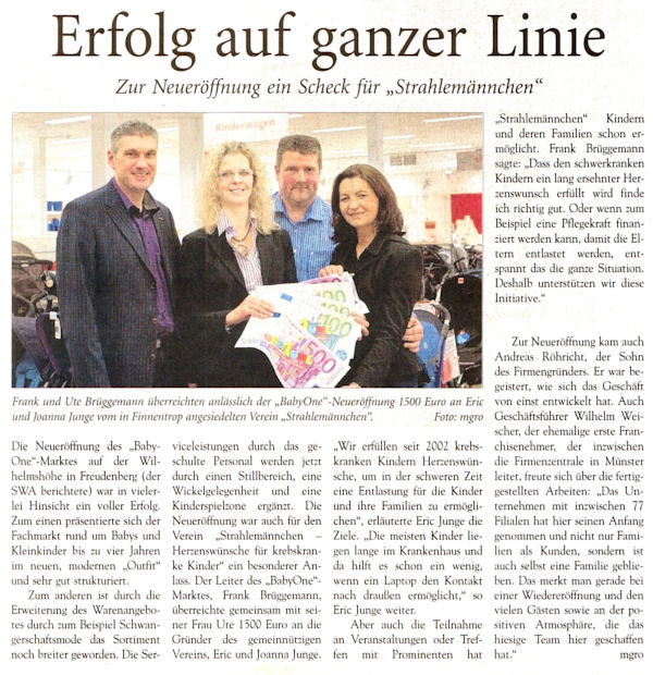 Erfolg auf ganzer Linie - Zur Neuer�ffnung ein Scheck f�r "Strahlem�nnchen"